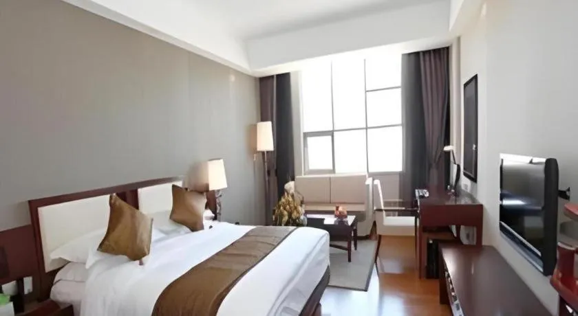 Bed in Kunming Wenhui Hotel