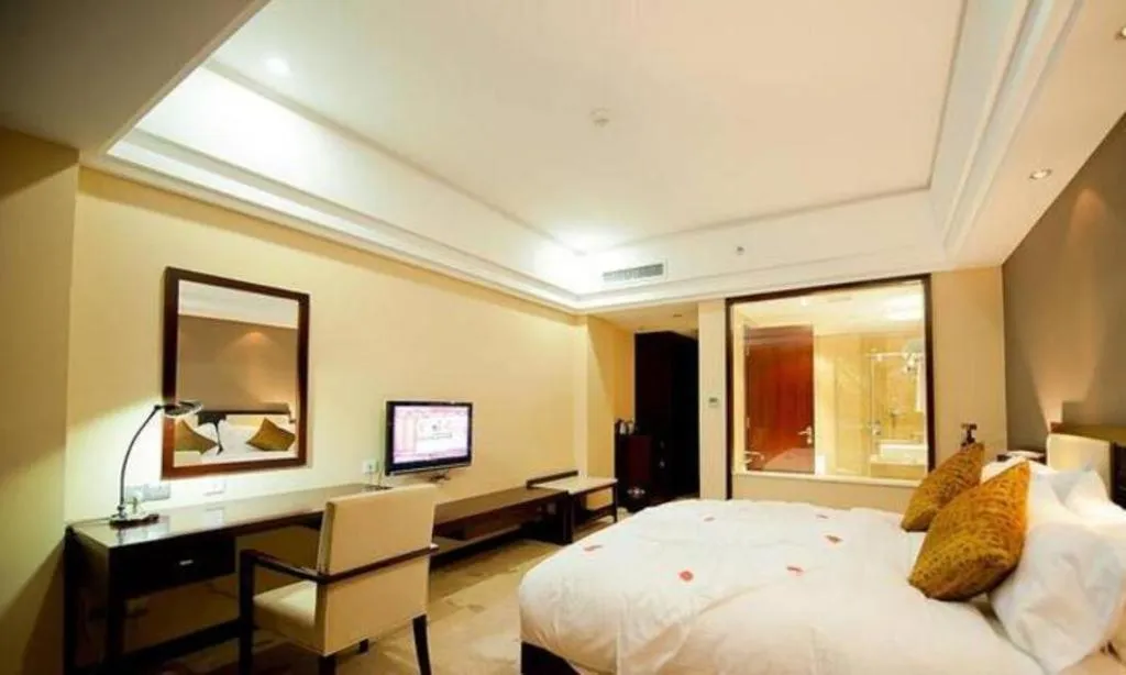 Bed in Kunming Wenhui Hotel