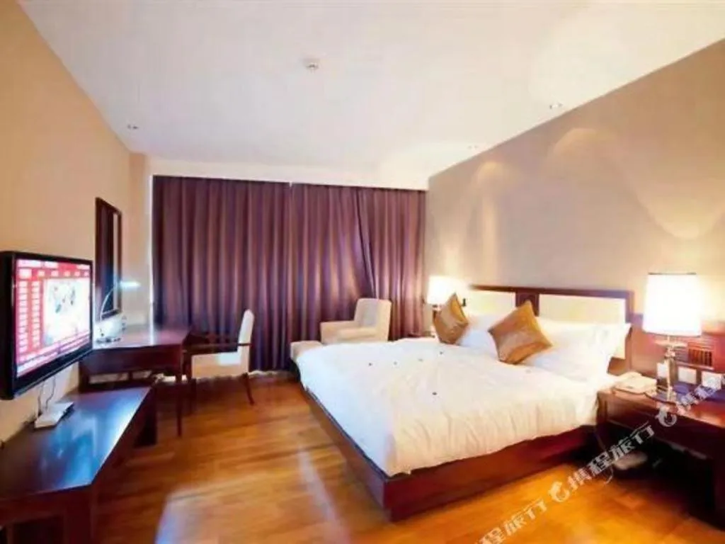 Bed in Kunming Wenhui Hotel