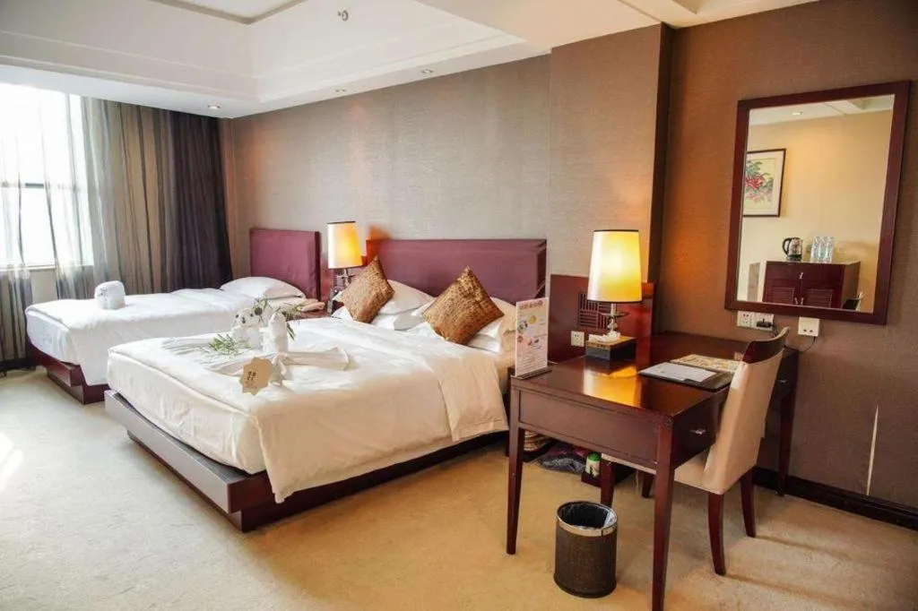 Bed in Kunming Wenhui Hotel