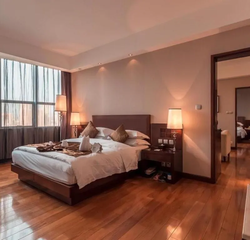 Bed in Kunming Wenhui Hotel