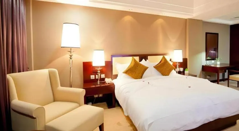 Bed in Kunming Wenhui Hotel