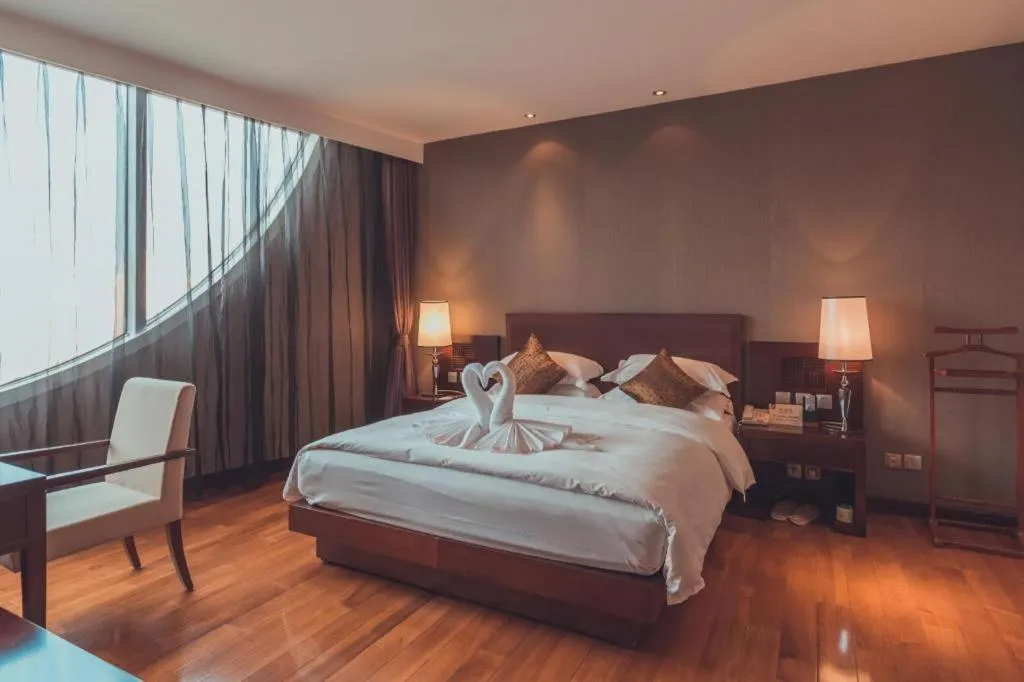 Bed in Kunming Wenhui Hotel