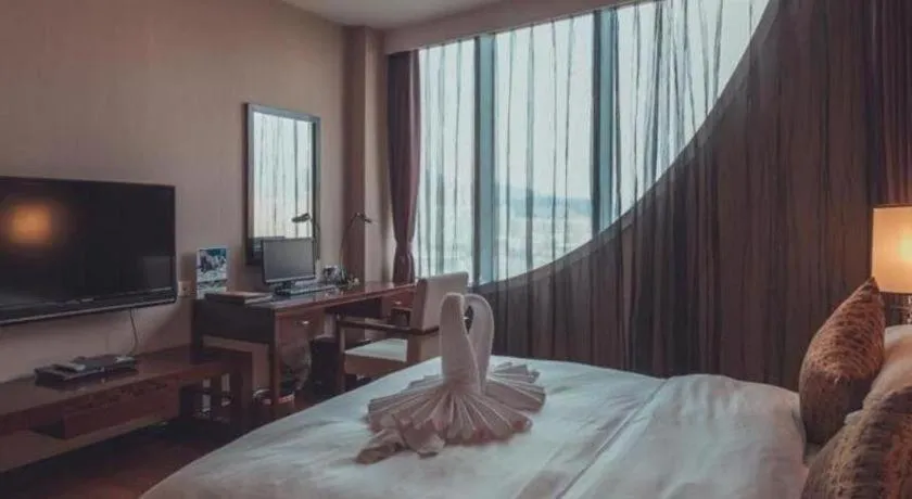 Bed in Kunming Wenhui Hotel