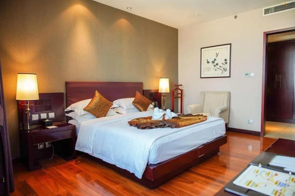 Bed in Kunming Wenhui Hotel