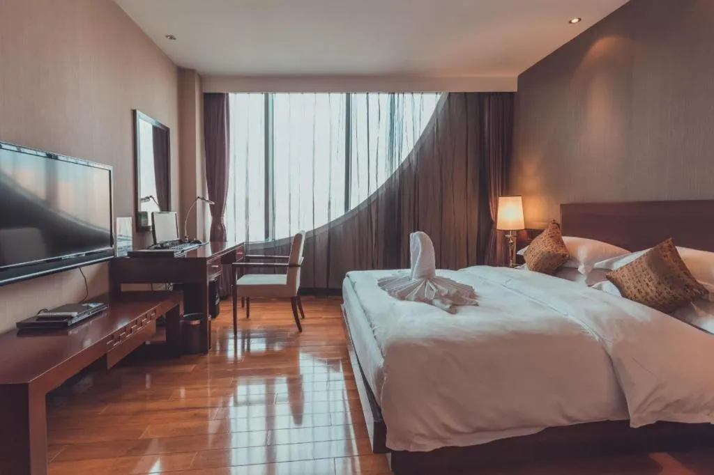 Bed in Kunming Wenhui Hotel