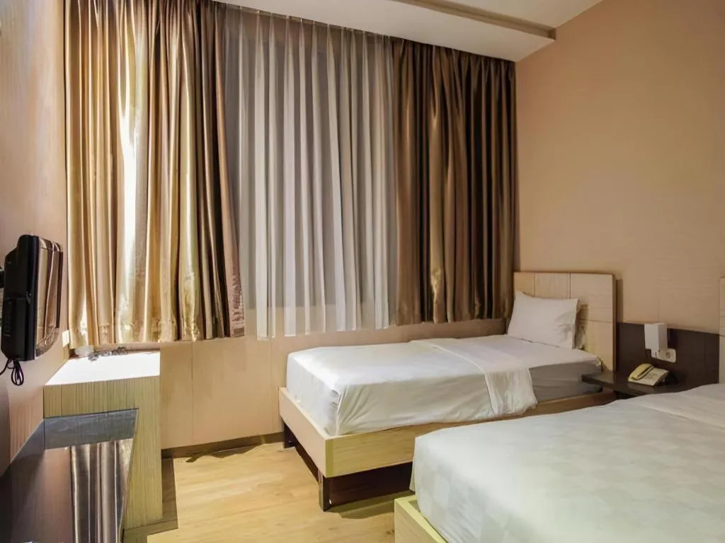 Bed in Lotus Hotel Subang