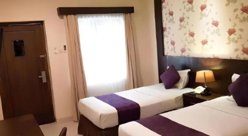 Bed in The Margangsa Hotel