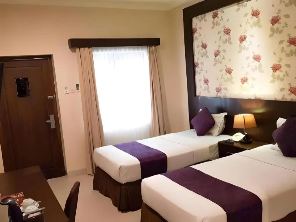 Bed in The Margangsa Hotel