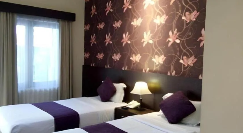 Bed in The Margangsa Hotel