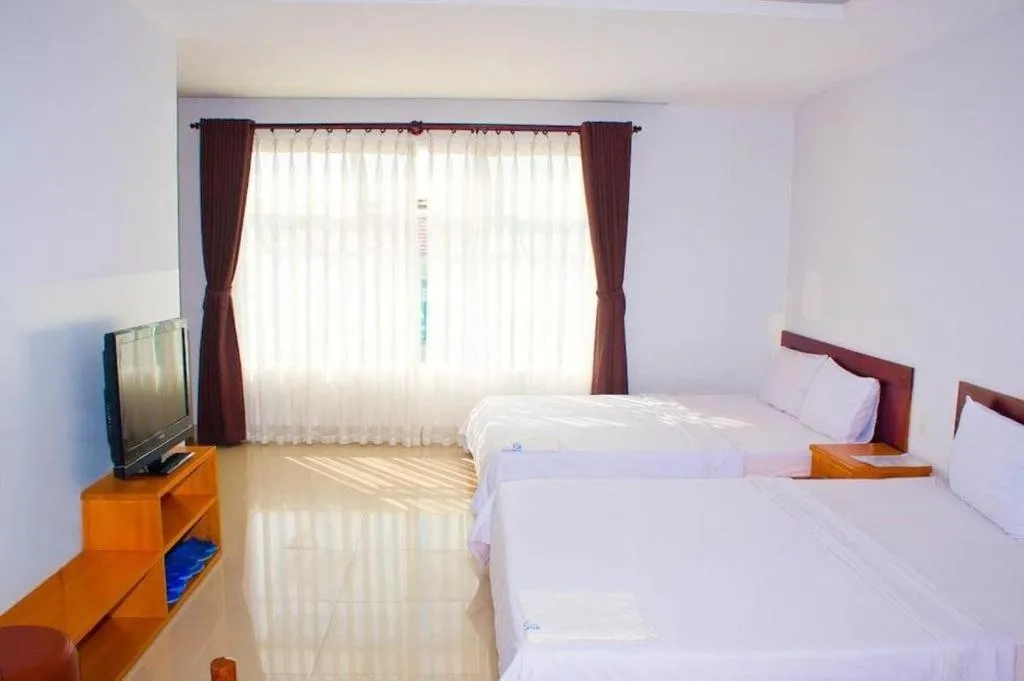 Bed in Thien Nga Family Hotel