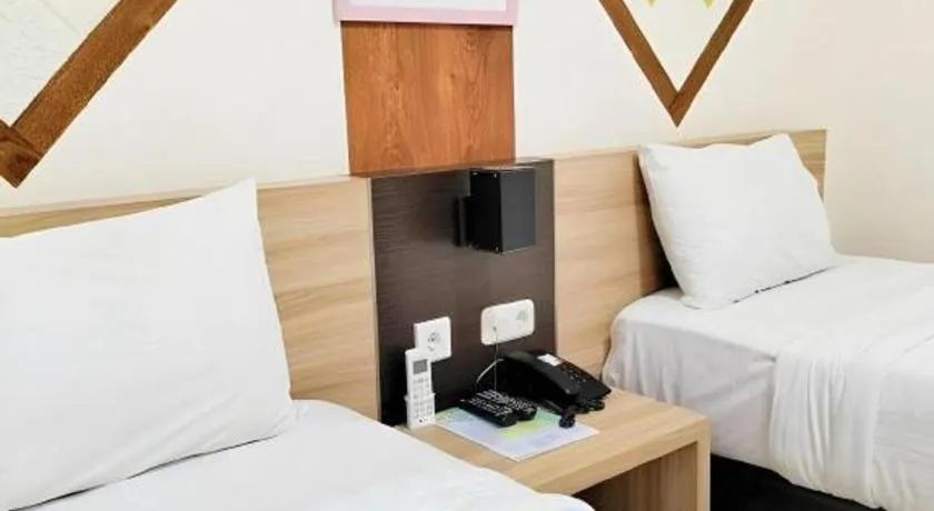 Bed in GARDEN HOTEL MAJALENGKA