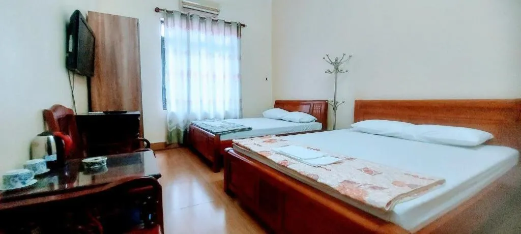 Bed in Linh Dan Hotel