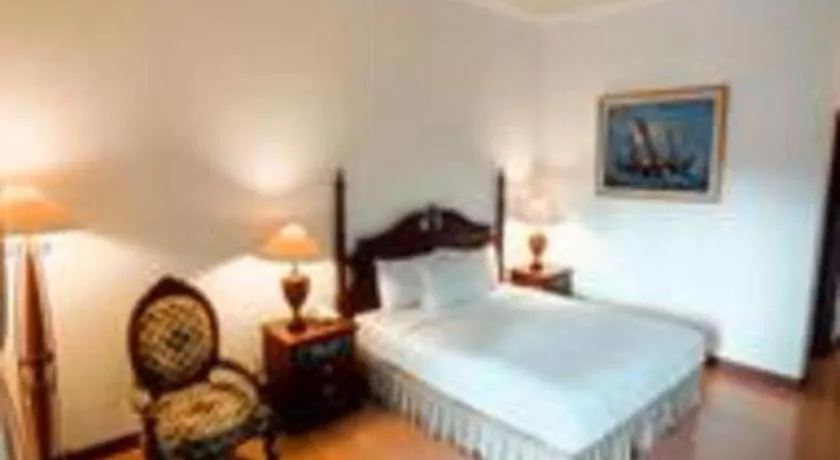 Bed in The Oxalis Regency Hotel