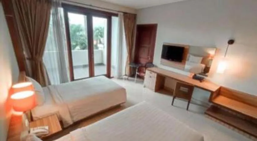 Bed in The Oxalis Regency Hotel