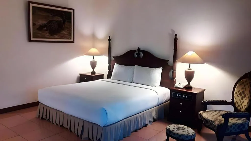 Bed in The Oxalis Regency Hotel