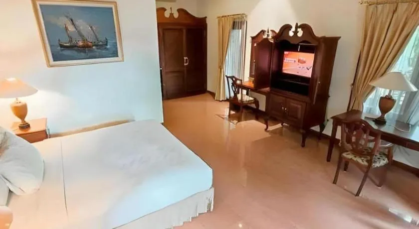 Bed in The Oxalis Regency Hotel