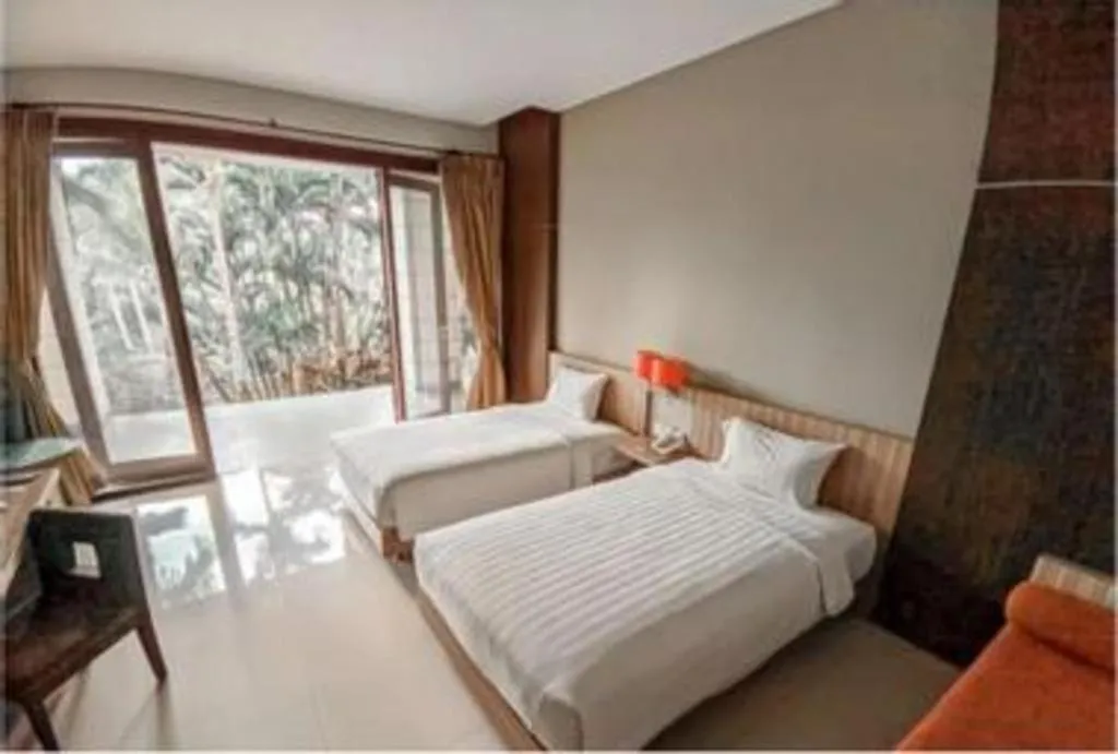 Bed in The Oxalis Regency Hotel