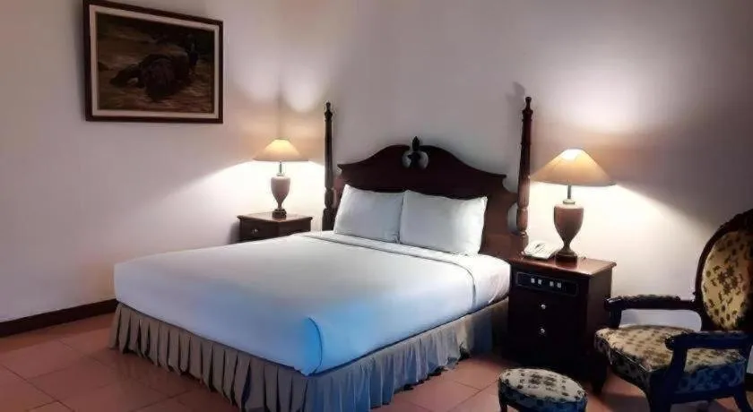 Bed in The Oxalis Regency Hotel