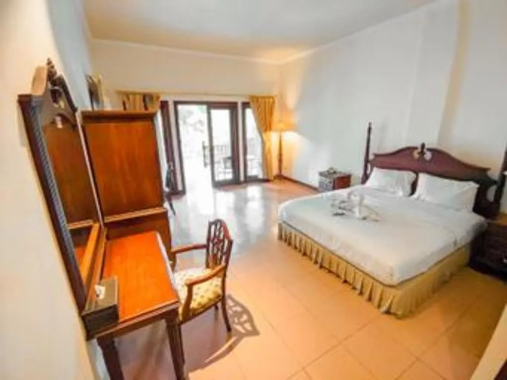 Bed in The Oxalis Regency Hotel