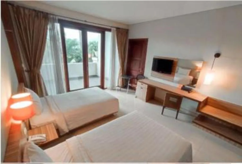 Bed in The Oxalis Regency Hotel