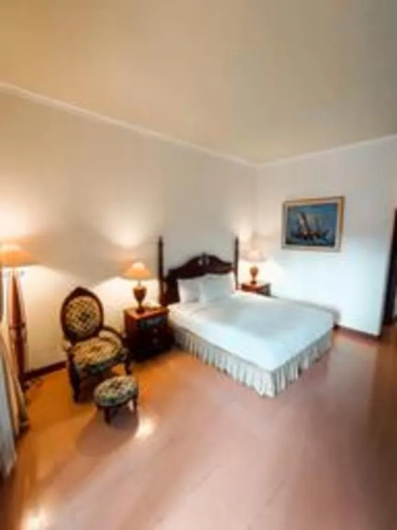 Bed in The Oxalis Regency Hotel