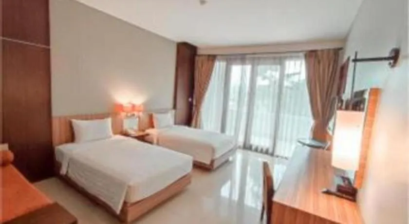 Bed in The Oxalis Regency Hotel