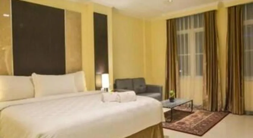 Bed in Sunbreeze Hotel