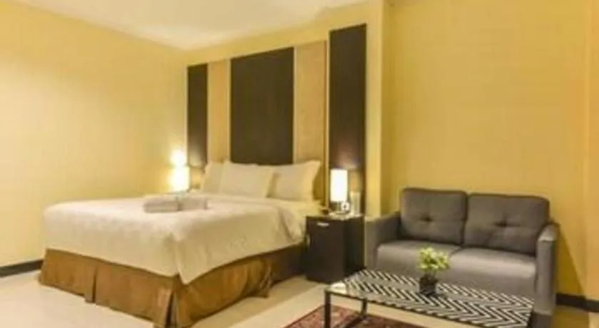 Bed in Sunbreeze Hotel