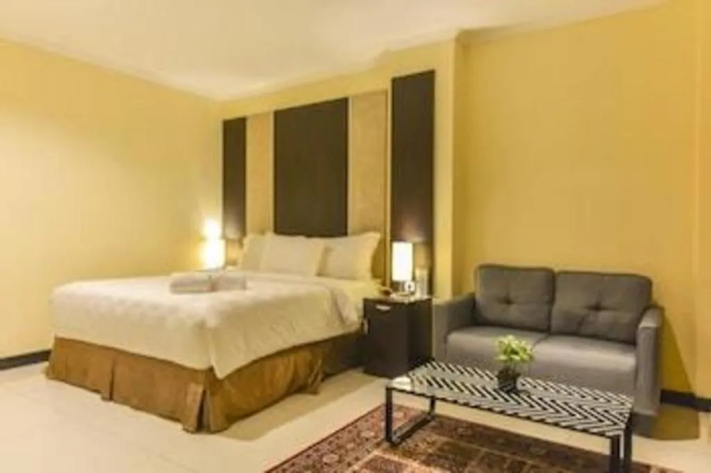 Bed in Sunbreeze Hotel