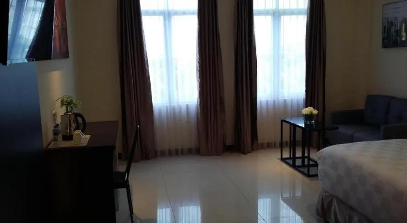 Bed in Sunbreeze Hotel