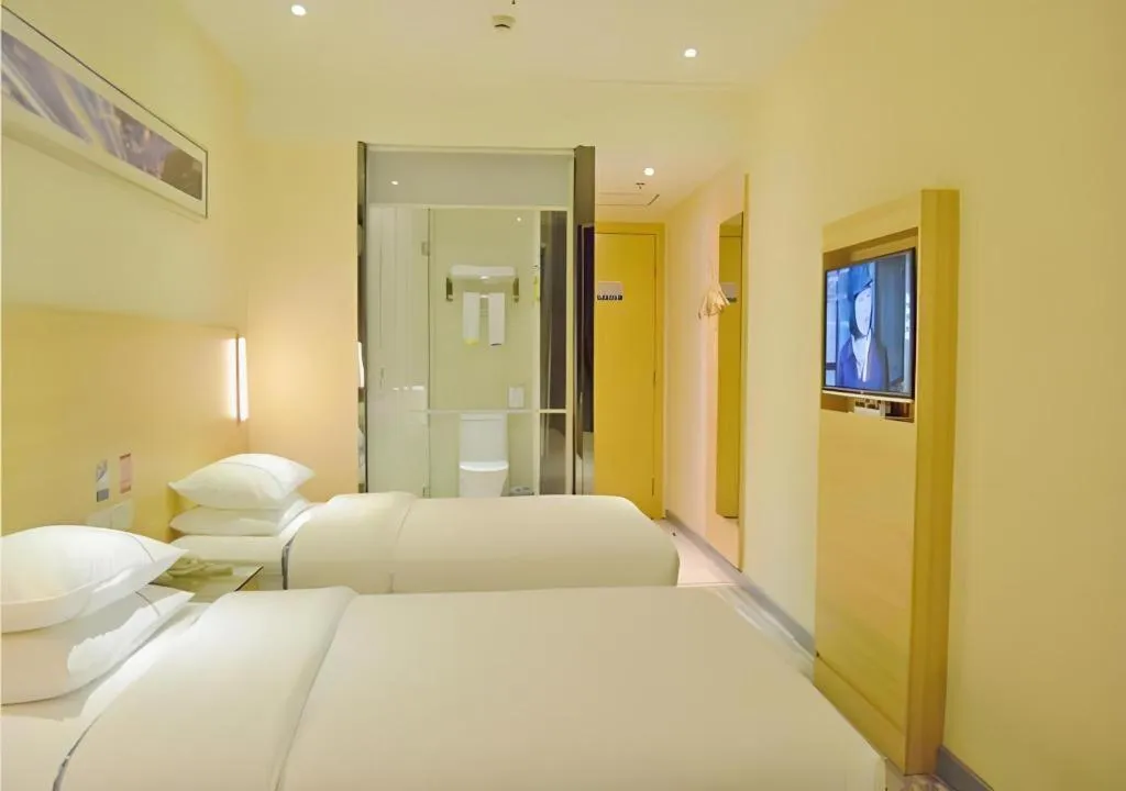 Bed in City Comfort Inn Yichang Gezhouba CBD Shopping Center