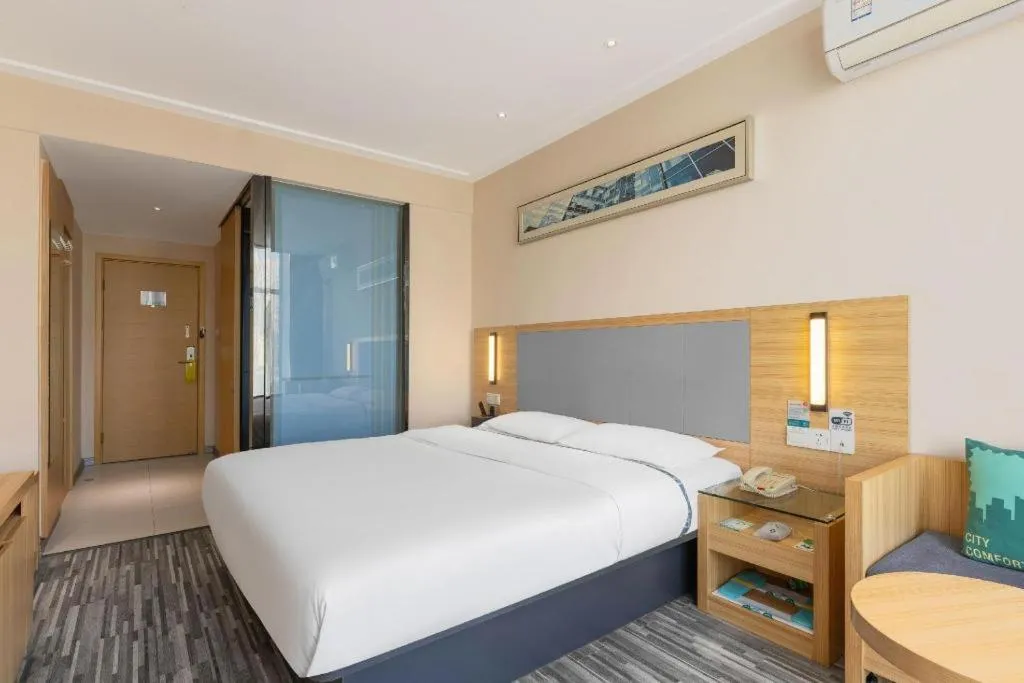 Bed in City Comfort Inn Yichang Gezhouba CBD Shopping Center