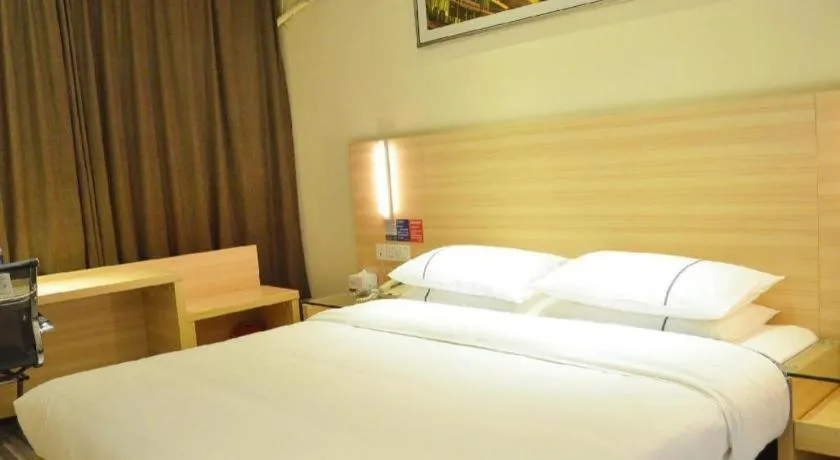Bed in City Comfort Inn Yichang Gezhouba CBD Shopping Center