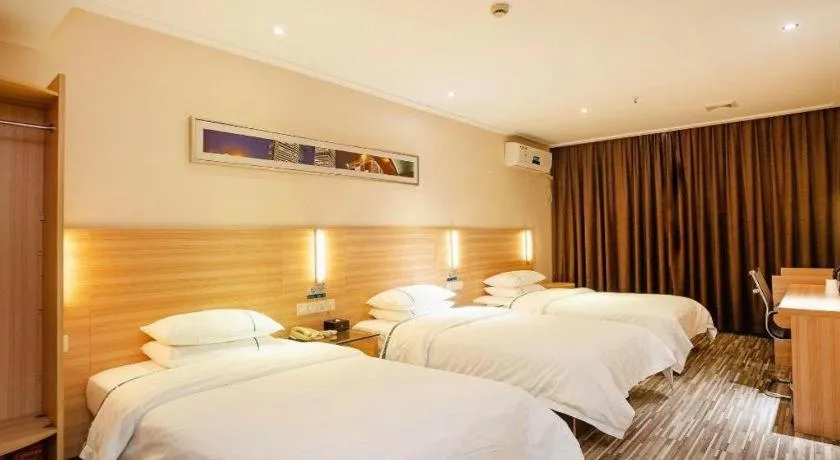 Bed in City Comfort Inn Yichang Gezhouba CBD Shopping Center