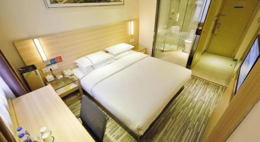 Bed in City Comfort Inn Yichang Gezhouba CBD Shopping Center