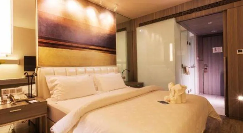 Bed in Jinjiang Metropolo Hotel - Qingdao Chengyang District Government