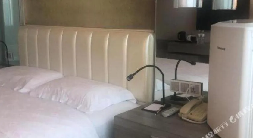 Bed in Jinjiang Metropolo Hotel - Qingdao Chengyang District Government