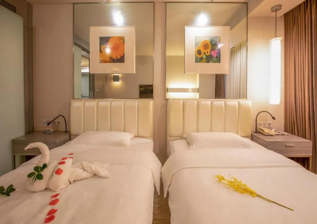 Bed in Jinjiang Metropolo Hotel - Qingdao Chengyang District Government