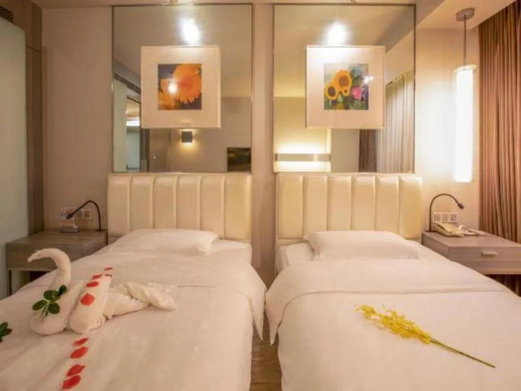 Bed in Jinjiang Metropolo Hotel - Qingdao Chengyang District Government