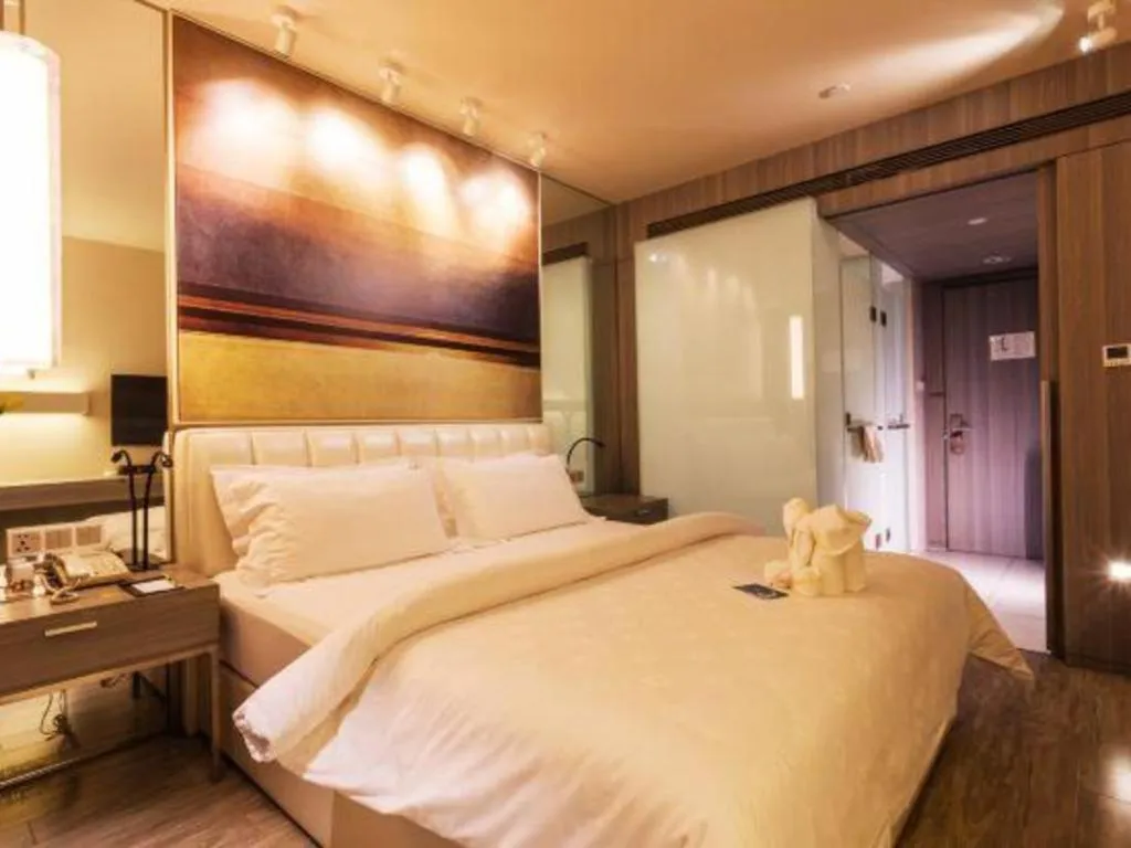 Bed in Jinjiang Metropolo Hotel - Qingdao Chengyang District Government