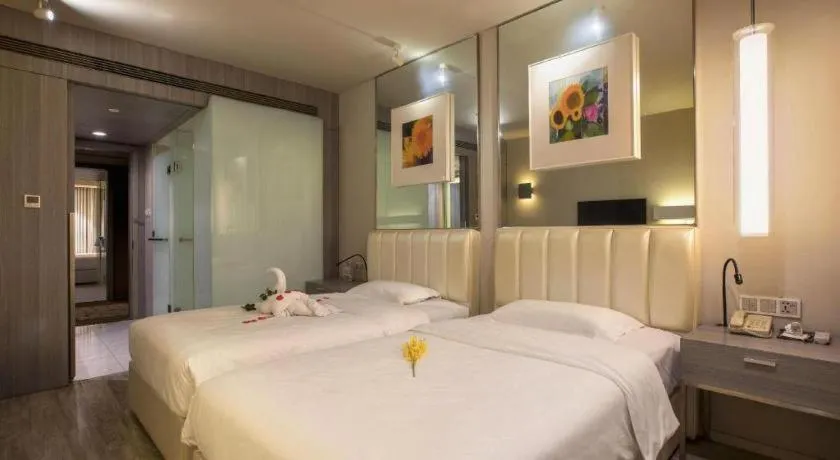 Bed in Jinjiang Metropolo Hotel - Qingdao Chengyang District Government