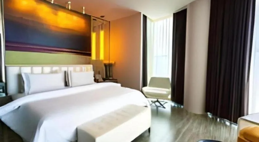 Bed in Jinjiang Metropolo Hotel - Qingdao Chengyang District Government