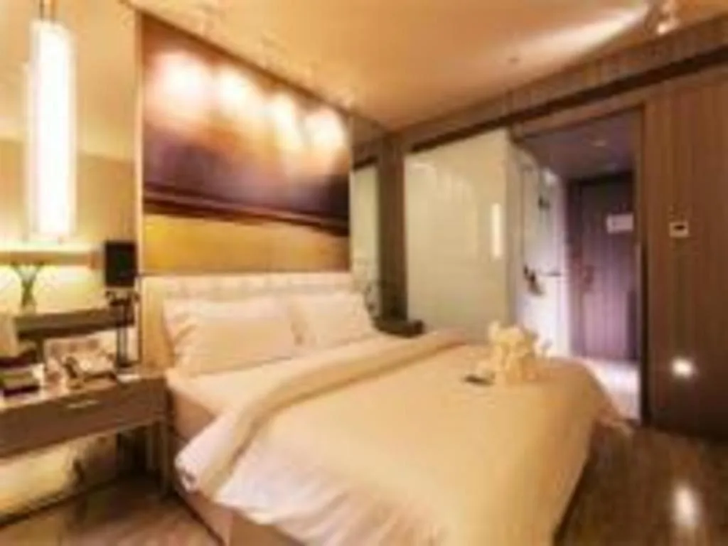 Bed in Jinjiang Metropolo Hotel - Qingdao Chengyang District Government