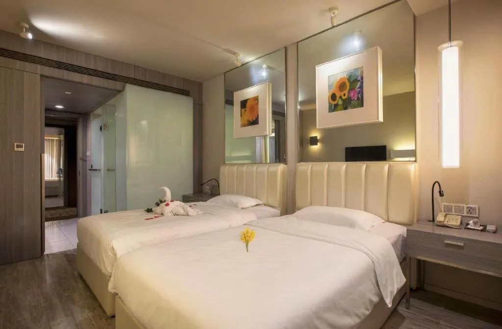 Bed in Jinjiang Metropolo Hotel - Qingdao Chengyang District Government