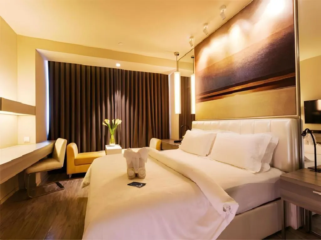 Bed in Jinjiang Metropolo Hotel - Qingdao Chengyang District Government