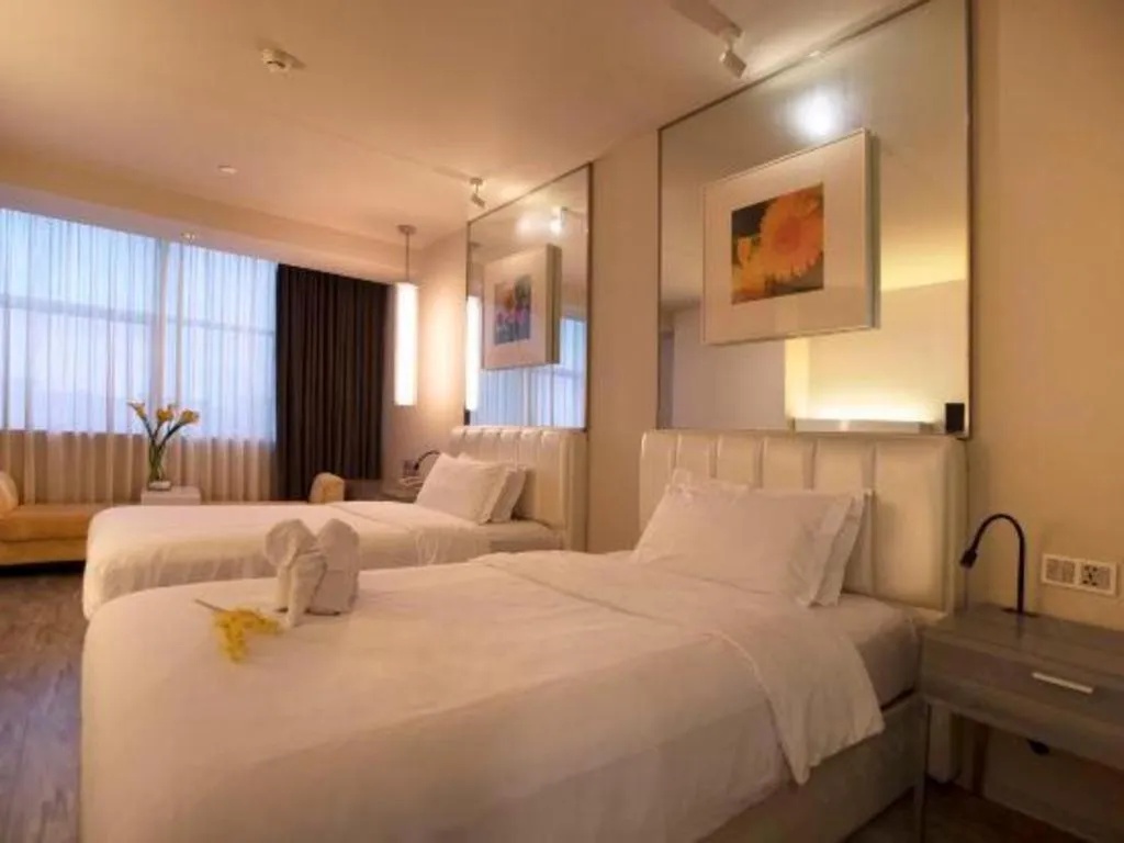 Bed in Jinjiang Metropolo Hotel - Qingdao Chengyang District Government