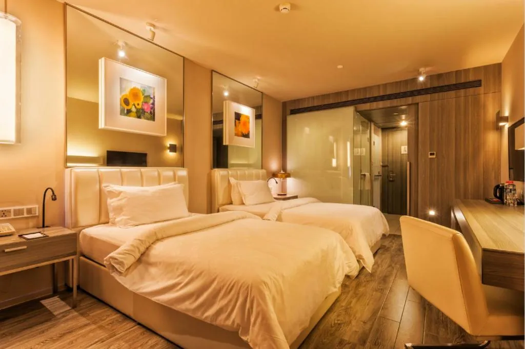 Bed in Jinjiang Metropolo Hotel - Qingdao Chengyang District Government