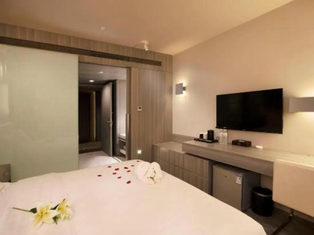 Bed in Jinjiang Metropolo Hotel - Qingdao Chengyang District Government