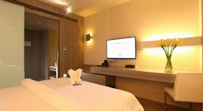 Bed in Jinjiang Metropolo Hotel - Qingdao Chengyang District Government